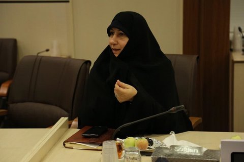 visite du représentant de l'Organisation Mondiale de la Santé avec des savants iraniens