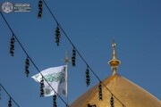 رفع راية أمير المؤمنين (عليه السلام) استعدادا للاحتفال بيوم الغدير الأغر+صور