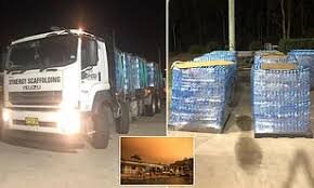 Muslim group are praised for travelling 200kms to donate 36,000 bottles of water to firefighters and bushfire victims
