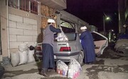 توزیع بسته های بهداشتی اوقاف کرمانشاه در حاشیه شهر