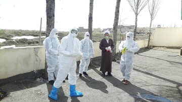 کفن و دفن اموات کرونایی توسط طلاب بستان آبادی+ عکس