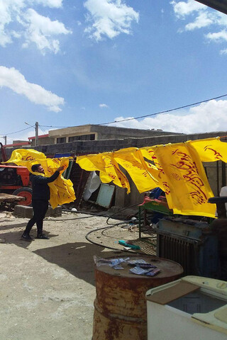 تصاویر /  نصب  ۱۲۰۰ پرچم با طرح «السلام علیکم یا اهل بیت النبوه» در مریانج