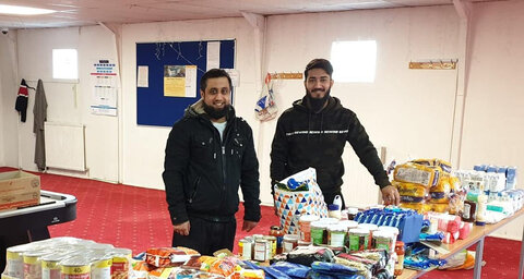 Fasting volunteers delivering lockdown food packs to vulnerable people in Leeds during Ramadan