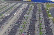 Incredible images show Muslims using an IKEA parking lot to pray safely while social distancing