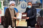 اهدای چک دو میلیارد ریالی قرارگاه مواسات و همدلی به دانشگاه علوم پزشکی فارس