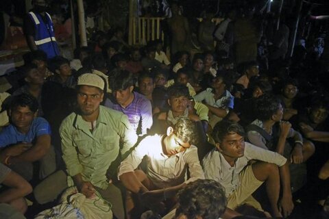 Almost 300 Rohingya Muslims land on beach in Indonesia