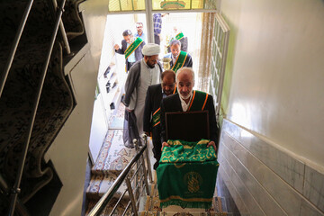 تکریم خانواده شهدای خدمت و مدافع حرم در سالروز ورود حضرت معصومه(س) به قم