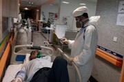تصاویر/  خدمت‌رسانی روحانیون جهادگر در بیمارستان‌های کرمانشاه