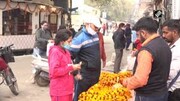 Muslim men make flower garlands for Hindus in Udhampur