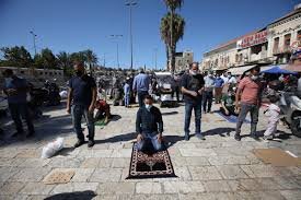 Israel bans thousands of Palestinians from praying at Al-Aqsa Mosque