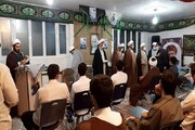 تصاویر/ تجلیل از طلاب ممتاز قرآنی و علمی مدرسه علمیه امیرالمومنین(ع) شهرستان صحنه