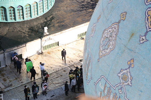 تصاویر / تعویض پرچم درسالروز تاسیس مسجد جمکران
