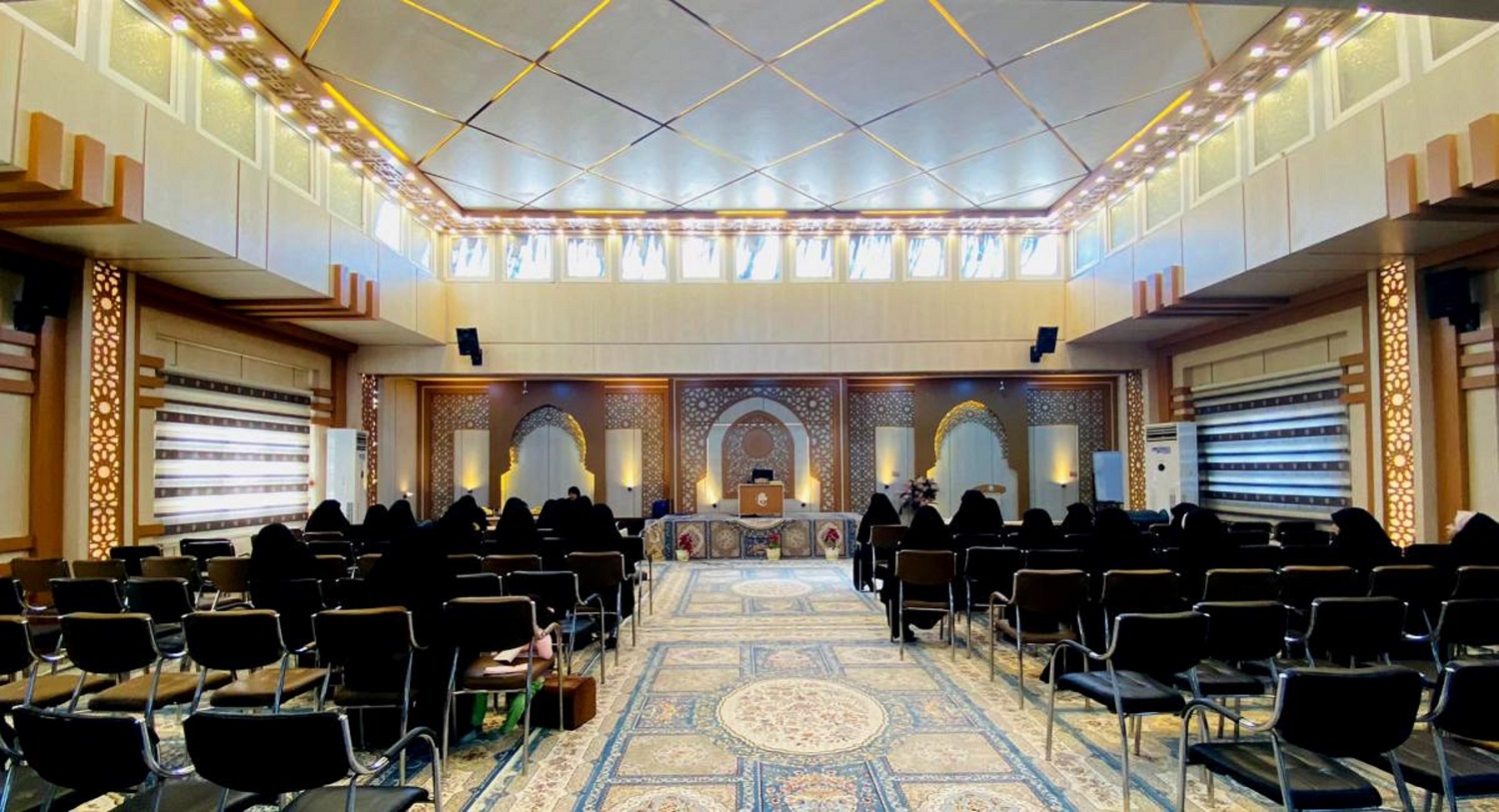 Holding a symposium on the oppression of lady az-Zahra (peace be upon her)