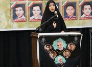 فیلم | شعرخوانی دختر شهید پورجعفری در گلزار شهدای کرمان