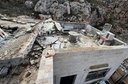Israeli municipality demolishes sections of two Palestinian-owned buildings