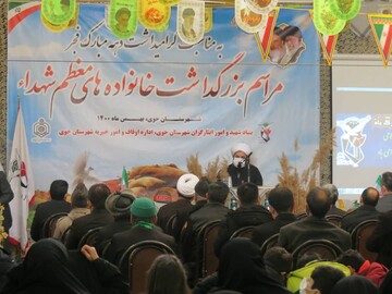 تصاویر/ تکریم خانواده شهدای شهرستان خوی