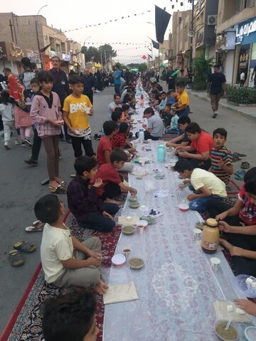 تصاویر/ بزرگترین سفره افطاری خیابانی درآران وبیدگل