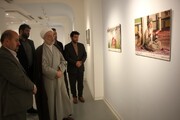 نماینده ولی‌فقیه در کردستان از نمایشگاه آثار عکاسان خبری بازدید کرد