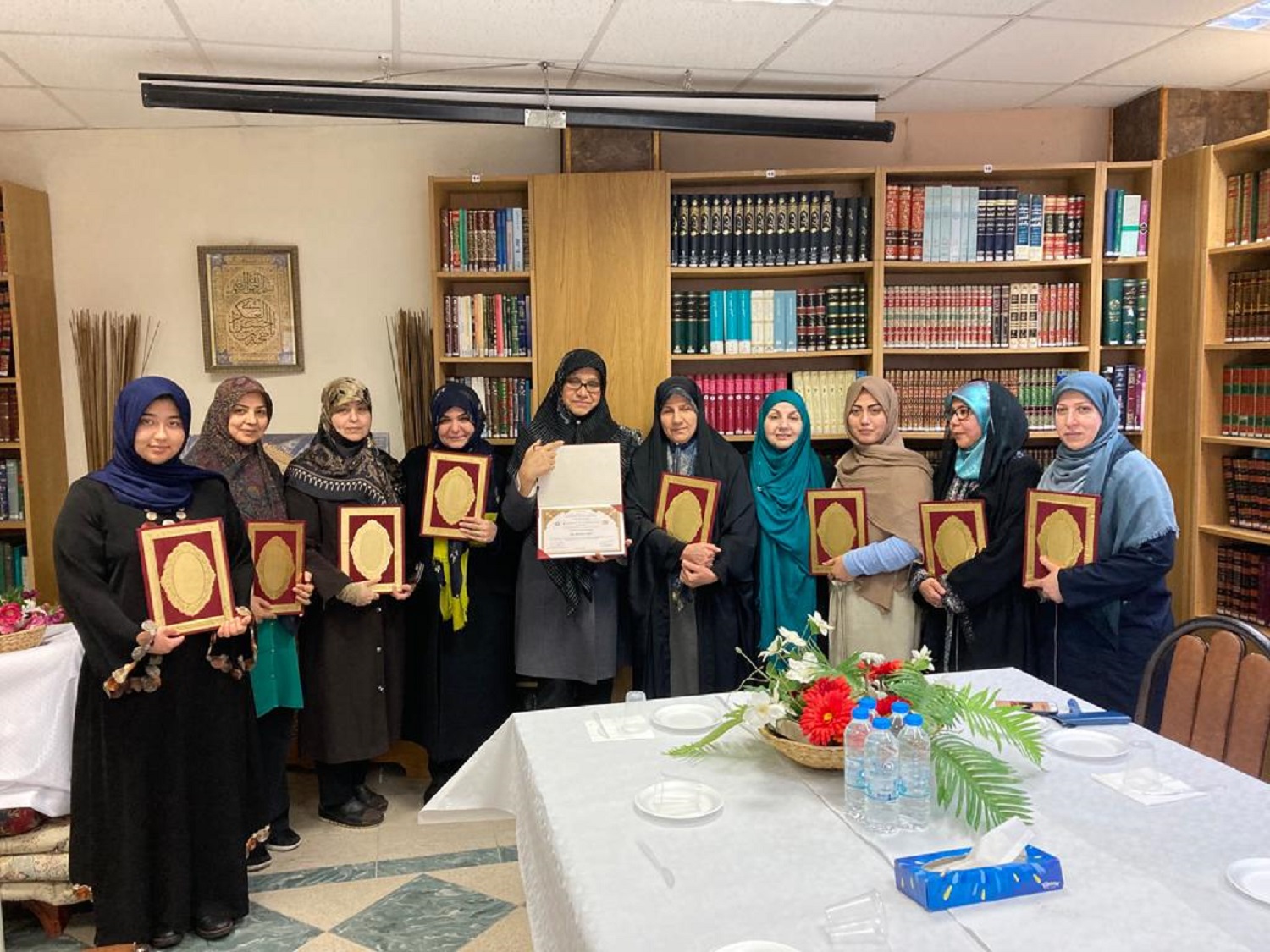 Women achieving Quranic awarding certificate at the Islamic Center of England