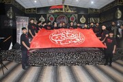 Al Abbas Holy Shrine Presents Dome Flag of Aba al-Fadl to a Procession in USA