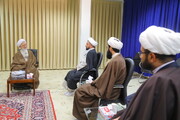 Photo/ Grand Ayatollah Javadi Amoli Receives Jurisprudence Center of Pure Imams' Research Council for Medical Jurisprudence