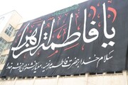 تصاویر/ نصب پرچم بزرگ فاطمیه در ارومیه