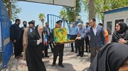 تصاویر/ تبرک اصحاب رسانه بوشهر به پرچم حرم رضوی