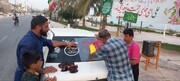 تصاویر/ ایستگاه کلیشه نویسی خودروها به مناسبت عید غدیر در بندر سیراف