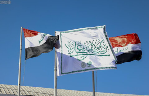 پرچم غدیر در فرودگاه بین المللی نجف بر افراشته شد + تصاویر