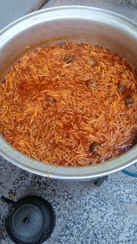تصاویر پخت و توزیع غذای گرم روز عید غدیر در پلدختر