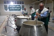 تصاویر/ خدمت رسانی جهادی آشپزخانه مرکزی موکب امام رضا(ع) در مرز خسروی