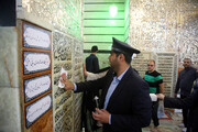 غبارروبی مزار شهدای دفاع مقدس مدفون در حرم حضرت معصومه(س)+تصاویر