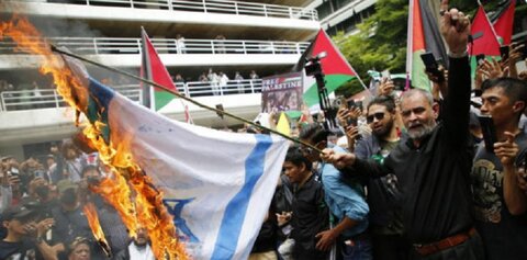 تھائی لینڈ میں غزہ پر جاری اسرائیلی بمباری کی مذمت اور فلسطینی مظلوم مسلمانوں کی حمایت میں مظاہرہ