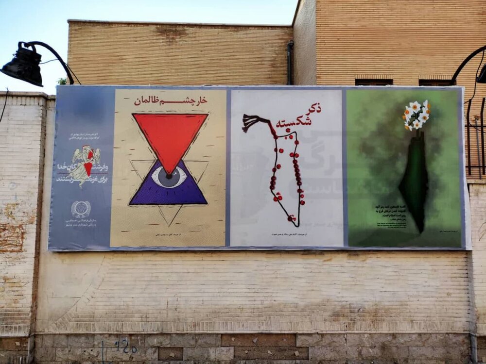 تصاویر/ نصب آثار هنرمندان کارگاه طوفان الاقصی در شهر بوشهر