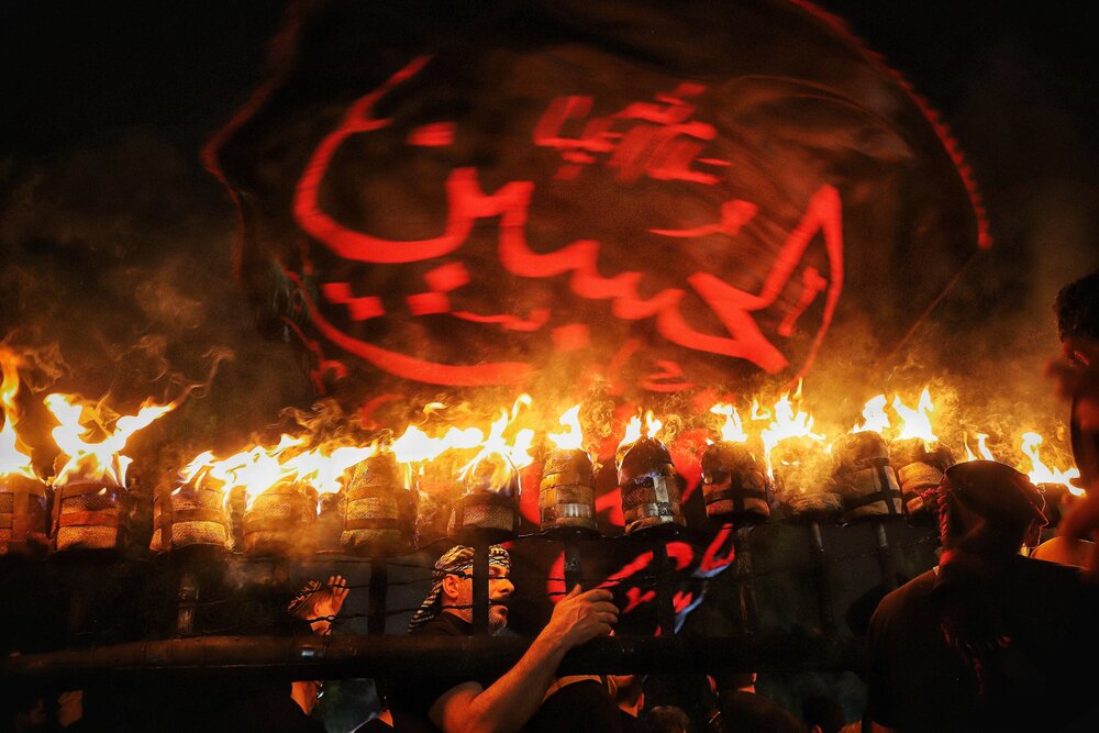 عکاس خبرگزاری حوزه حائز رتبه برتر دومین سوگواره عکس مشعل