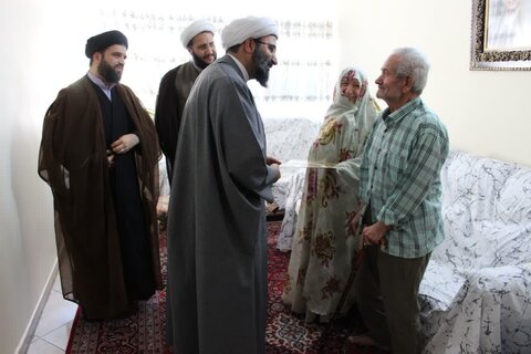 حضور مدیر حوزه علمیه تهران در منزل سه شهید طلبه