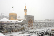 تصاویر/ روضہ منورہ امام رضا (ع) میں برفباری