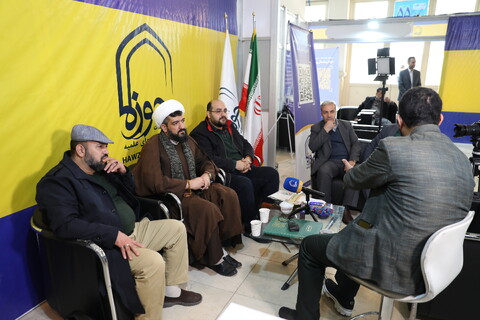 تصاویر/ حال و هوای غرفه خبرگزاری حوزه در نمایشگاه رسانه‌های ایران