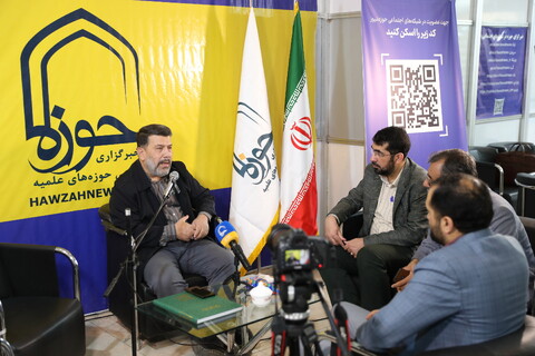 تصاویر/ حال و هوای غرفه خبرگزاری حوزه در نمایشگاه رسانه‌های ایران
