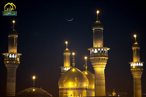 هلال ماه رمضان بر فراز گنبدهای حرم امامین جوادین (ع)