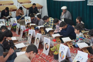 تصاویر/ اجتماع نوجوانان قرآنی اشکذر در حمایت از غزه