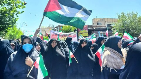 تصاویر/حضور طلاب مدرسه علمیه  فاطمه الزهرا(س)ساوه در اجتماع بزرگ حامیان حمله سپاه به اسرائیل