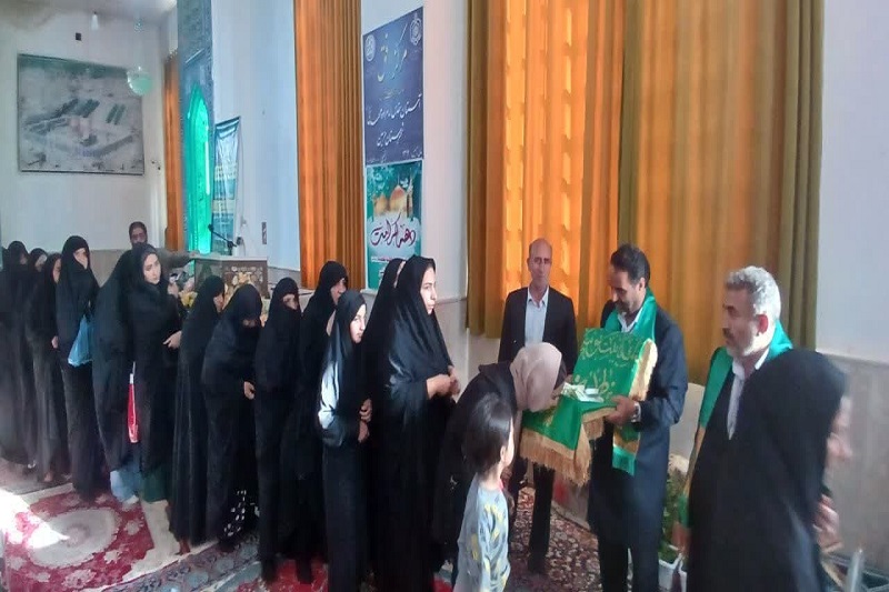 تصاویر/ استقبال از پرچم متبرک حرم حضرت فاطمه معصومه (س) در هرسین