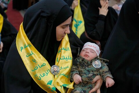 الاحتفال التكريمي الذي أقامه حزب الله للشهداء الأبرار الرئيس الإيراني ورفاقه