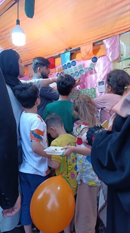 تصاویر/ برپایی موکب تخصصی چاپ عکس روی لباس در مهمانی باشکوه عید غدیر شهرستان بابل
