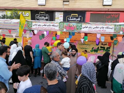 تصاویر/ برپایی موکب تخصصی چاپ عکس روی لباس در مهمانی باشکوه عید غدیر شهرستان بابل