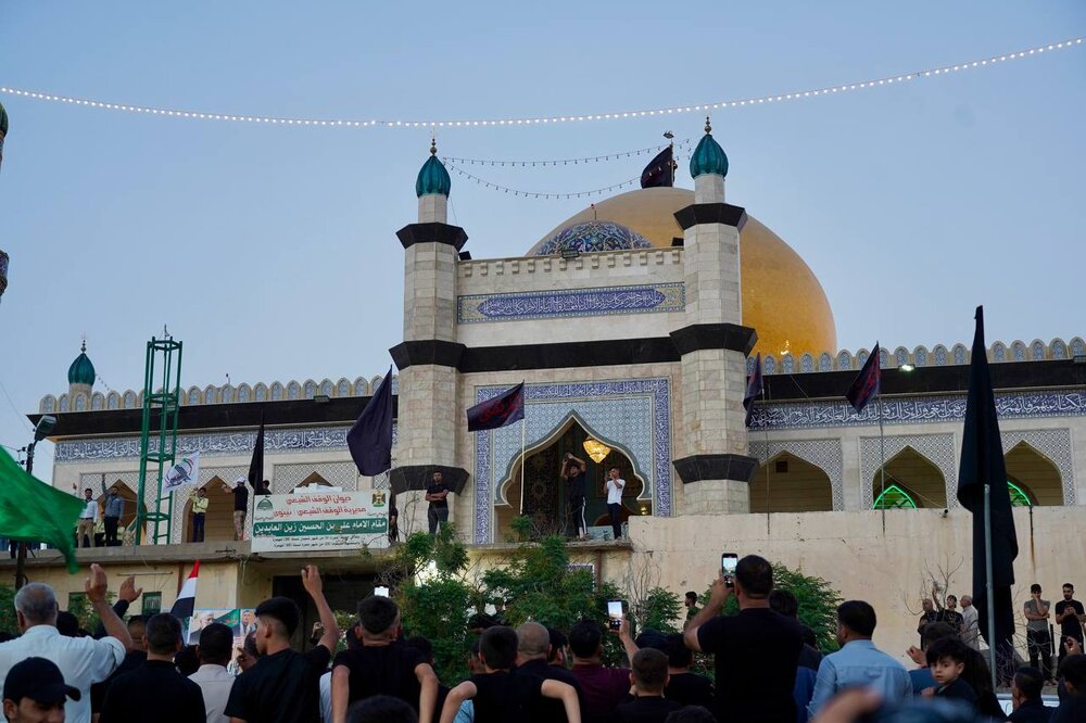 راية الحسين السوداء ترفرف في سماء الموصل