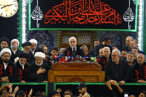 تبديل الراية الحمراء للقبة الحسينية الى راية الحزن والعزاء