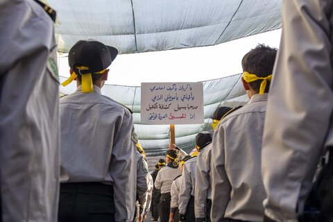 حضور اعضای جمعیت پیش آهنگی "الکفیل" در راهپیمایی حسینی