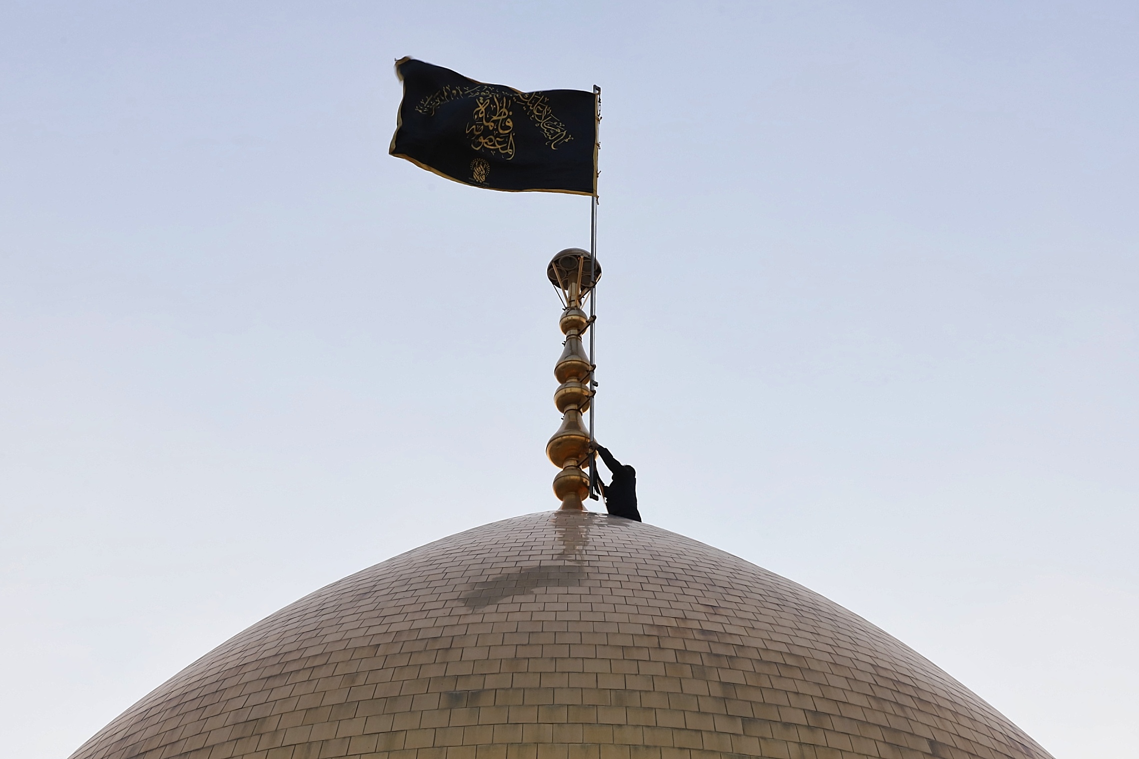 Black flag raised in Lady Masuma shrine for mourning occasions